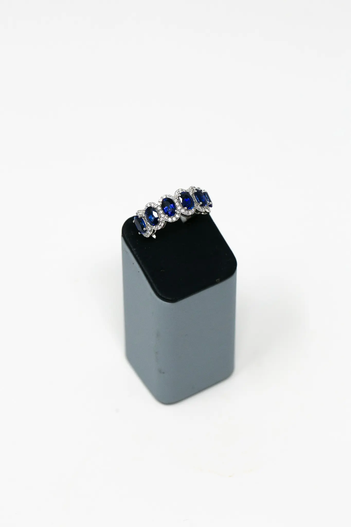 Semi Eternity Oval Blue Sapphire With Diamond Halo in White Gold