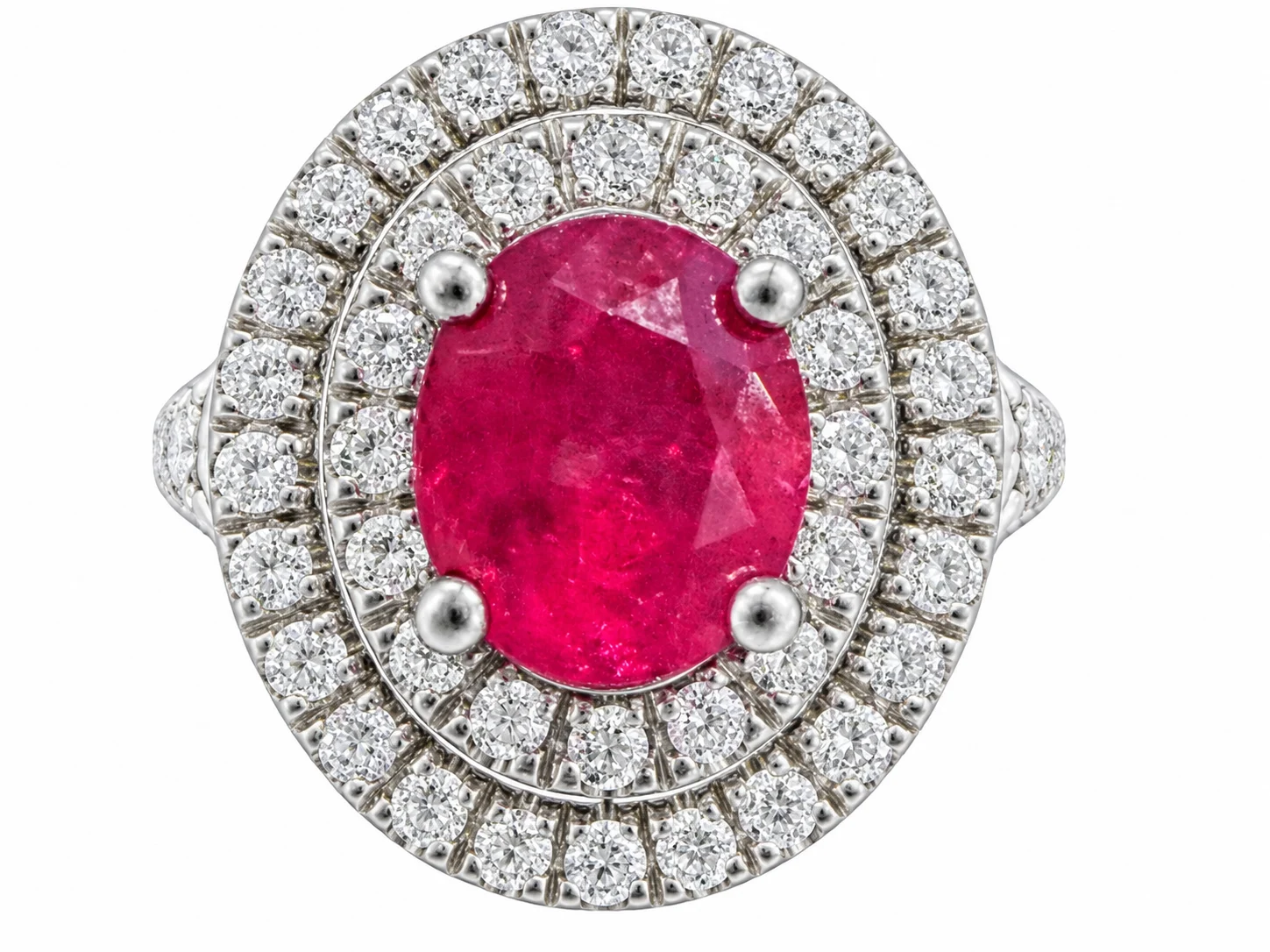 Oval Ruby With Double Diamond Halo In White Gold