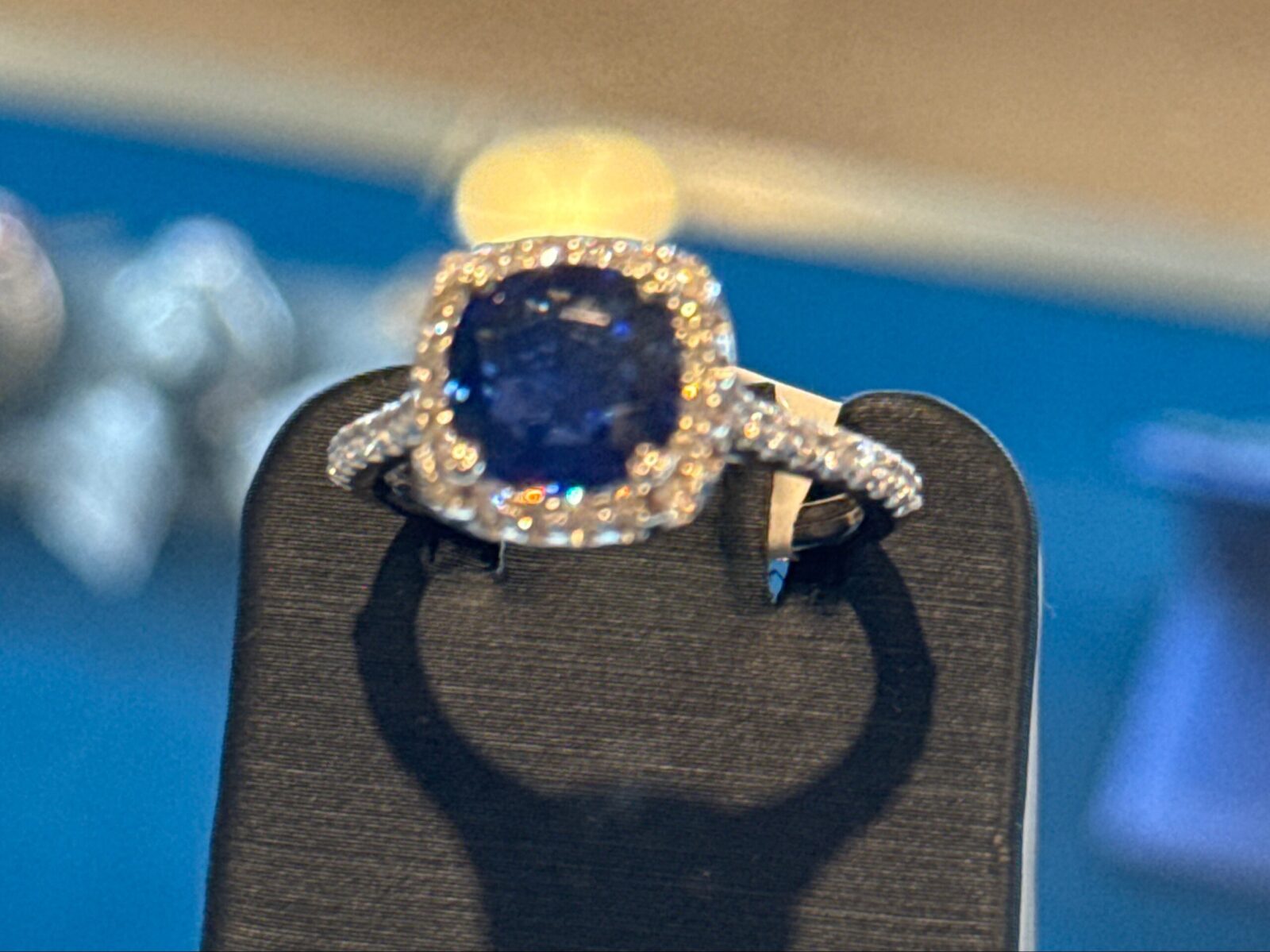 Cushion Cut Blue Sapphire With Diamond Halo In White Gold