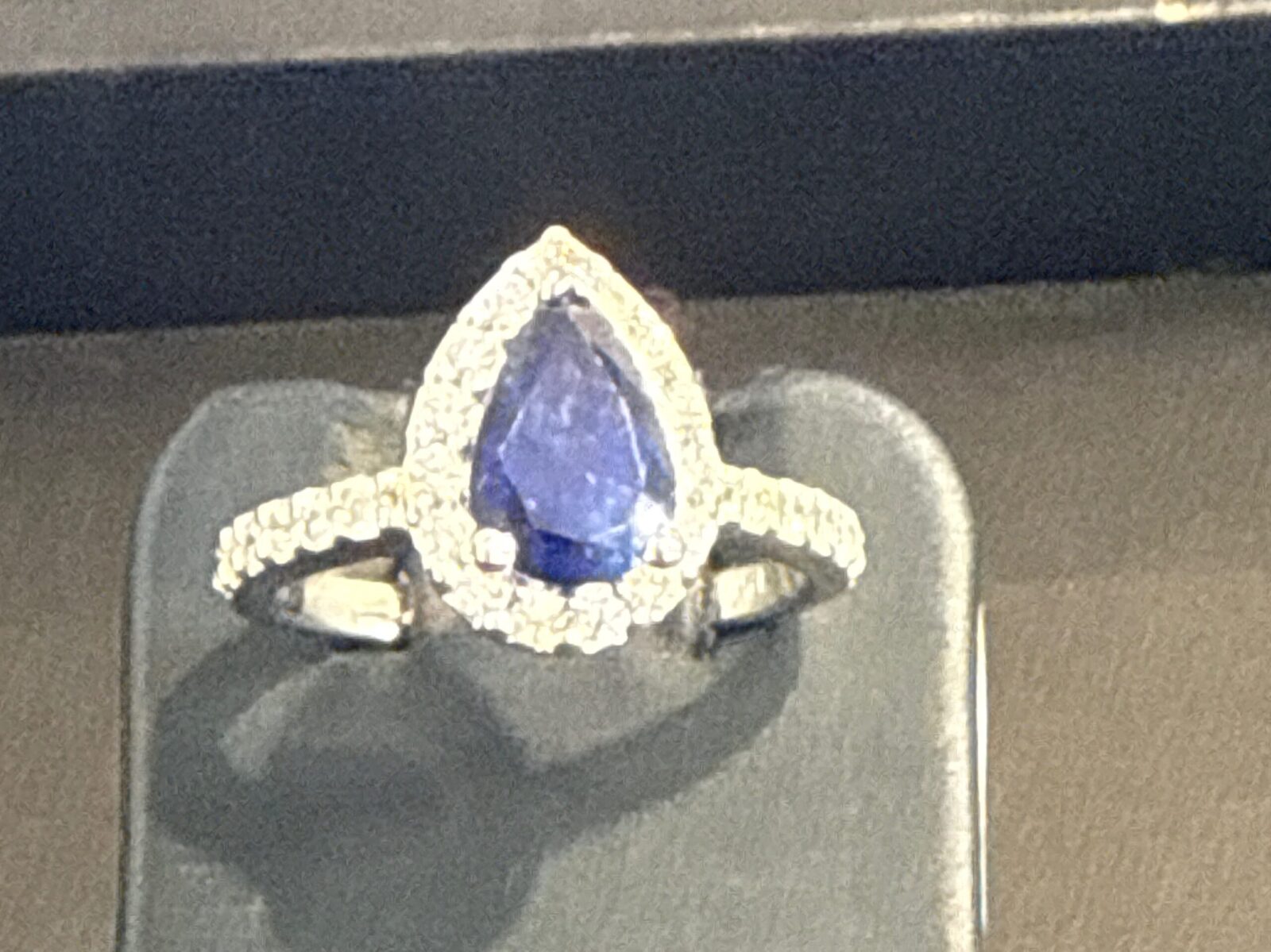 Pear Shape Blue Sapphire With Diamond Halo in White Gold