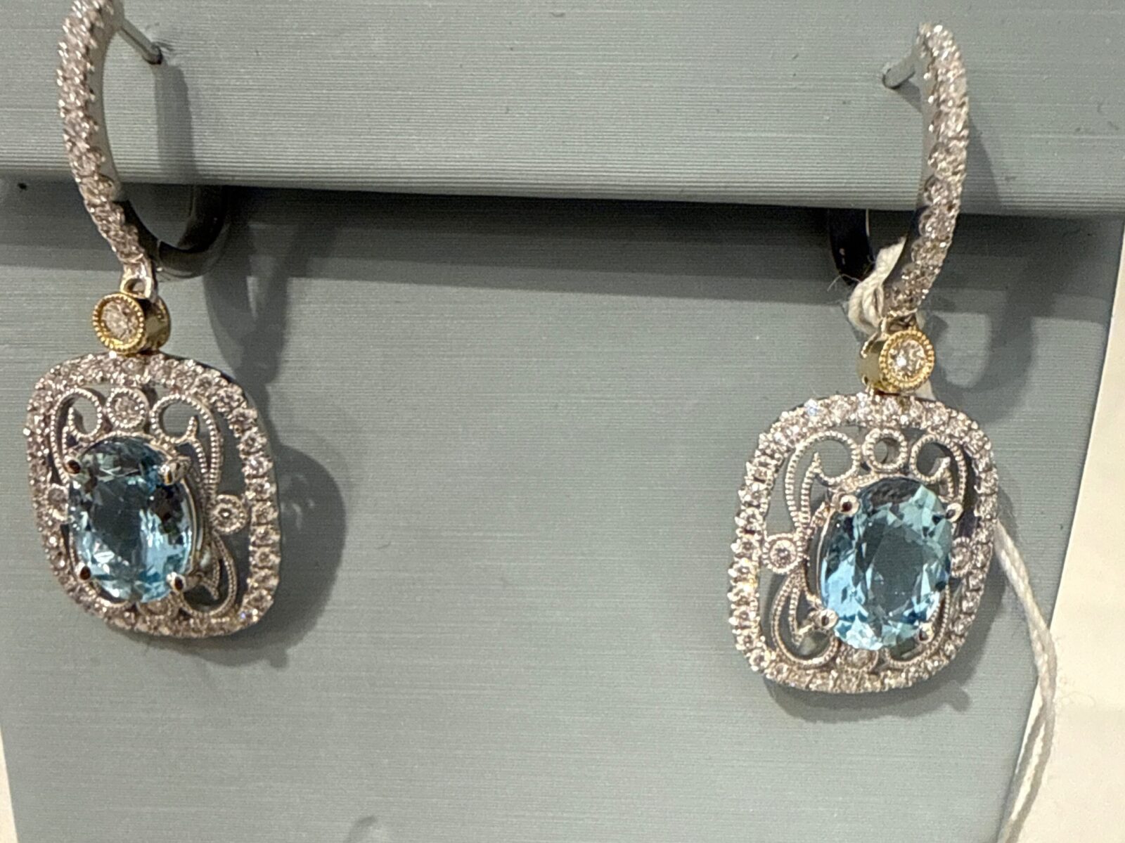 Oval Aqua Marine With Diamon Halo in White Gold