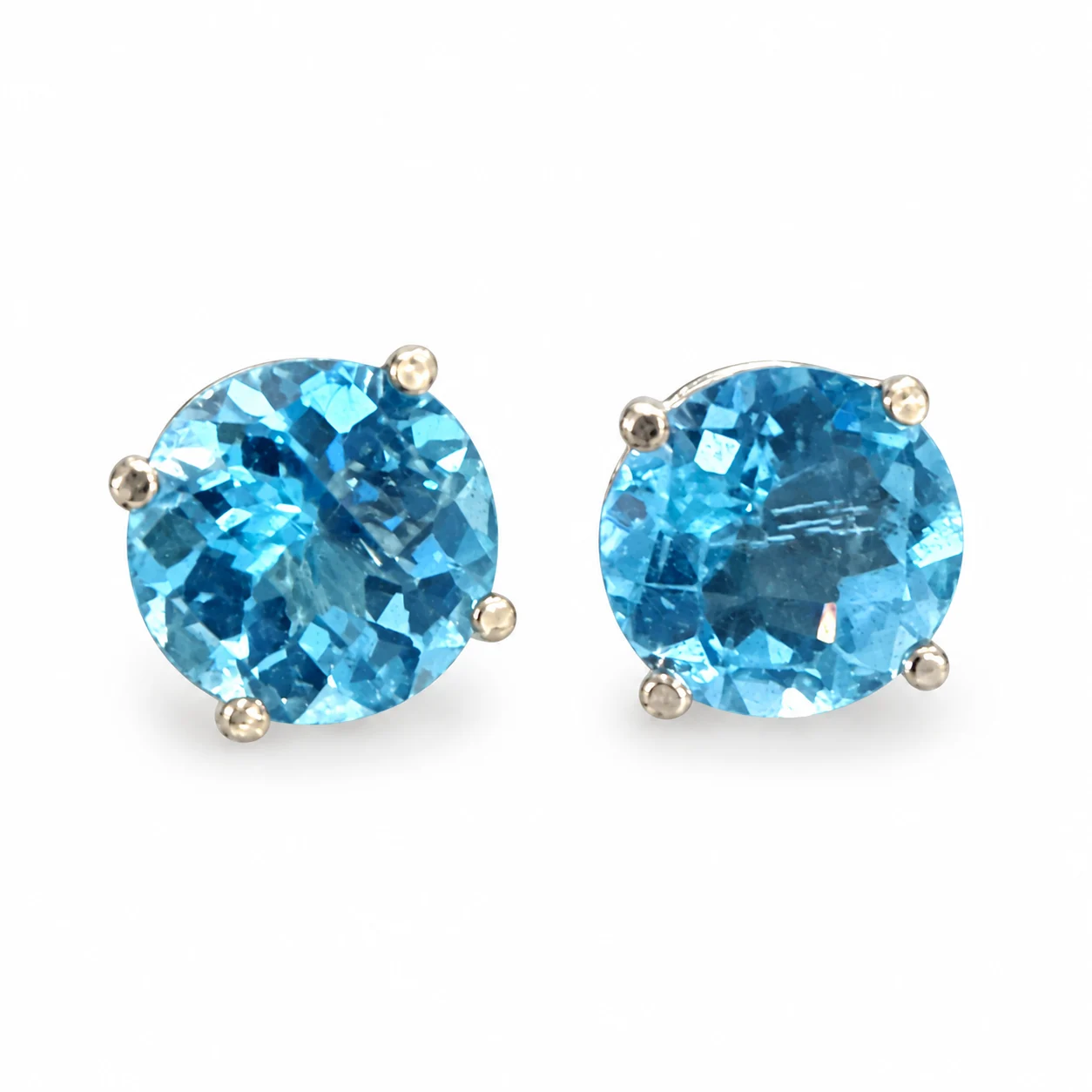 Round Blue Topaz Studs In White Gold