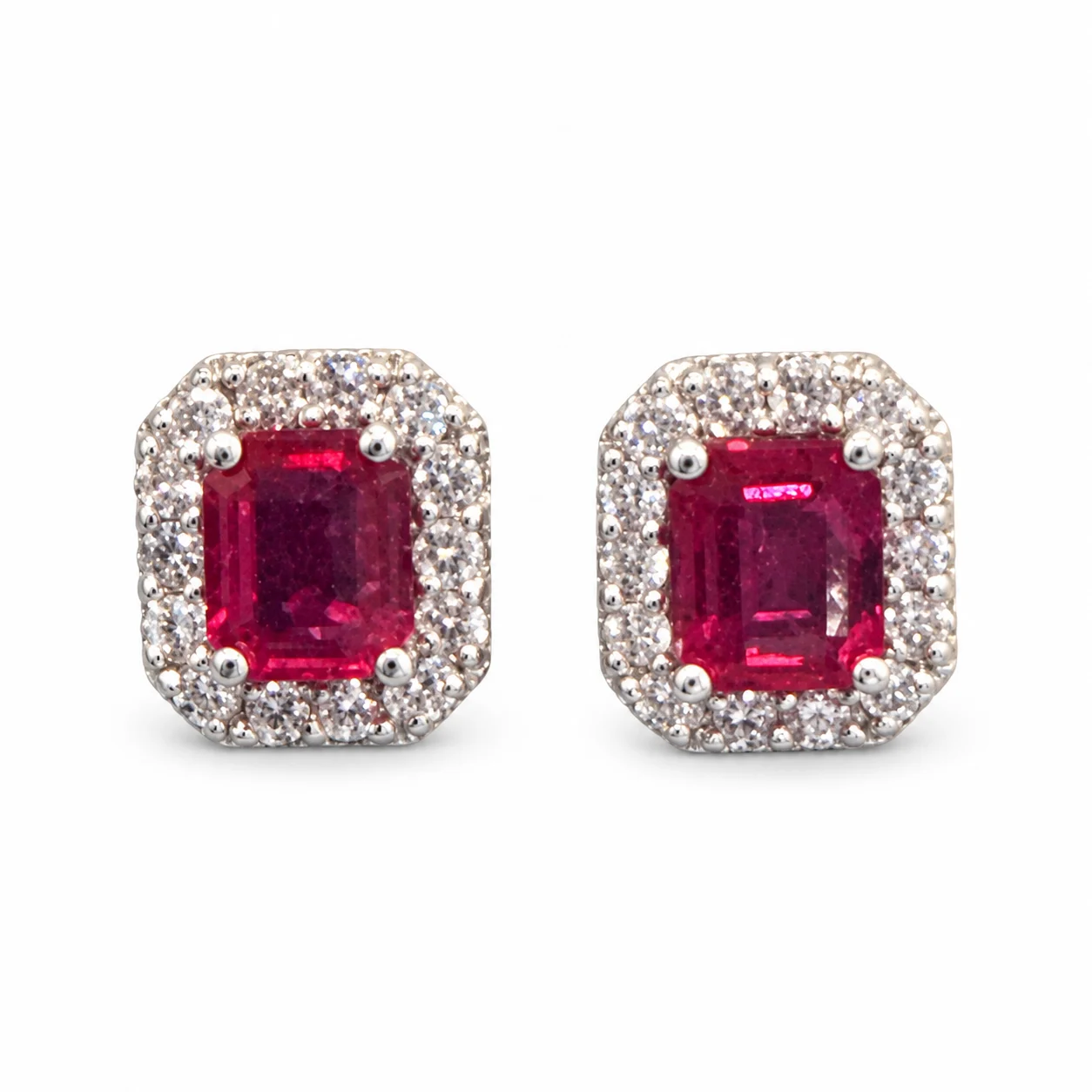 Emerald Cut Ruby With Diamond Halo In White Gold
