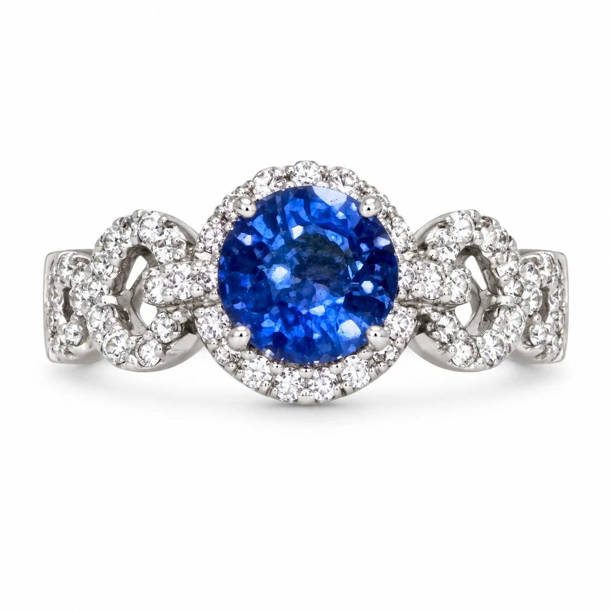 Round Blue Sapphire With Diamond Halo in White Gold