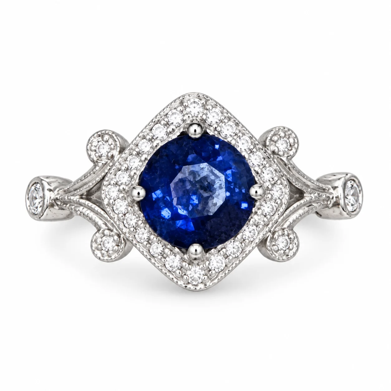 Round Blue Sapphire With Diamond Halo In White Gold