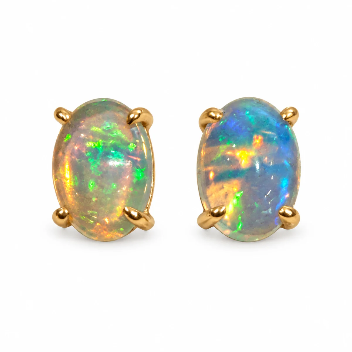 Oval opal stud earrings in yellow gold